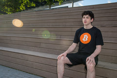 Person wearing the Bitcoin logo t-shirt